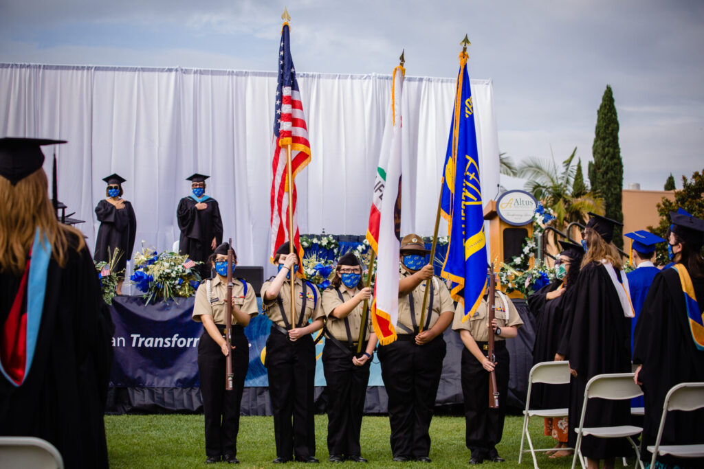 cadet corps presenting colors at graduation